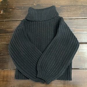 Black turtleneck sweater